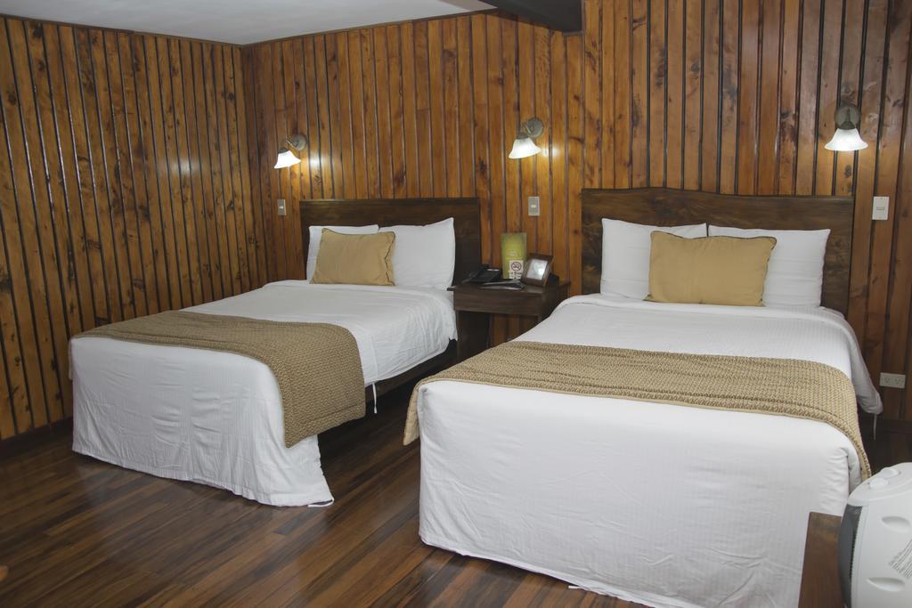 Hotel Chalet Tirol Heredia Pokoj fotografie