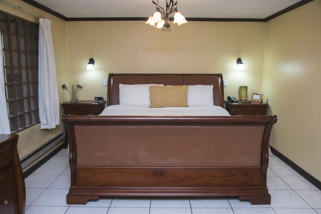 Hotel Chalet Tirol Heredia Pokoj fotografie