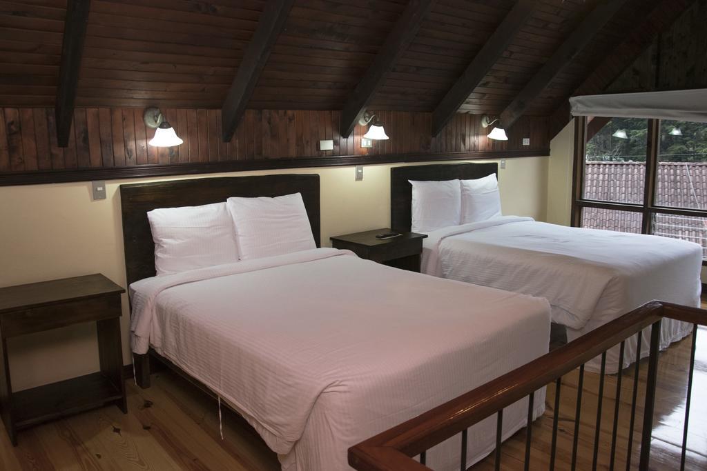 Hotel Chalet Tirol Heredia Pokoj fotografie