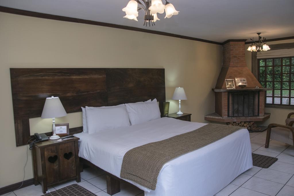 Hotel Chalet Tirol Heredia Pokoj fotografie